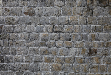 Plakat graue Steinmauer