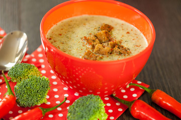 Bowl of chili pepper and broccoli soup