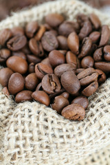 coffee beans on wooden surface