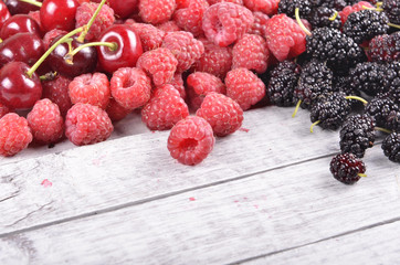 berries on wooden background