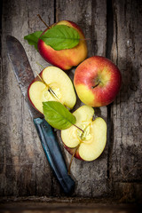 Fresh apples with leaves