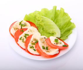 Tomato with mozzarella and salad