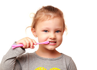 Happy kid girl brushing white teeth isolated