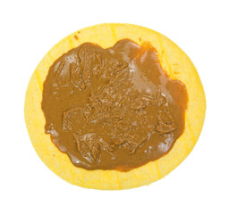 Peanut butter spread on corn tortilla