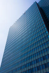 Modern glass silhouettes on modern building.