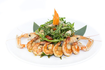 shrimp salad greens vegetables and crayfish in the restaurant