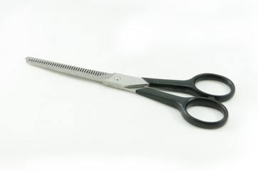 Barber scissors with plastic handles isolated over white