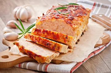 Fototapeten Homemade ground meatloaf with ketchup and rosemary © timolina