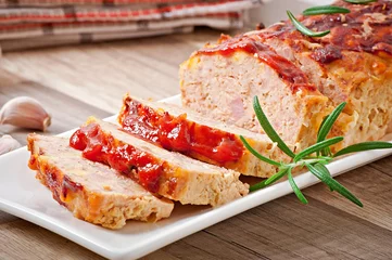 Foto op Aluminium Homemade ground meatloaf with ketchup and rosemary © timolina