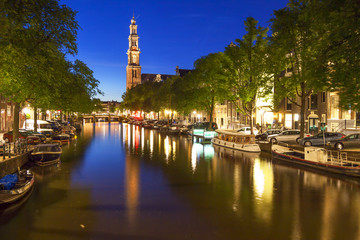 Fototapeta na wymiar Western church on Prinsengracht canal in Amsterdam