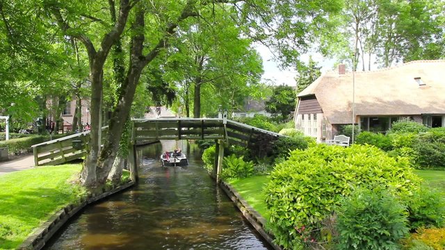 Typical Dutch houses and gardens in Giethoorn, The Netherlands