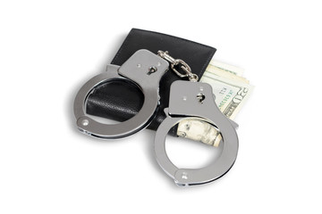 Handcuffs, wallet and dollar banknotes isolated, clipping path. 