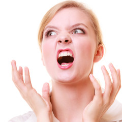 Angry businesswoman furious woman screaming