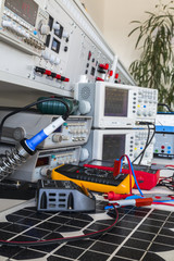 faulty solar regulator  on solar panel in laboratory