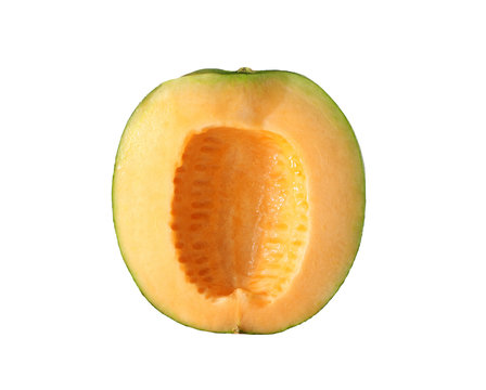 Cantaloupe melon cut into slices isolated on white.