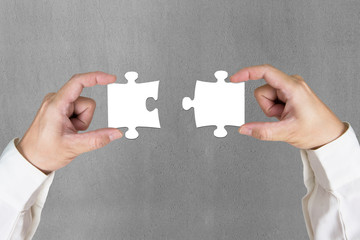 Connecting two puzzles
