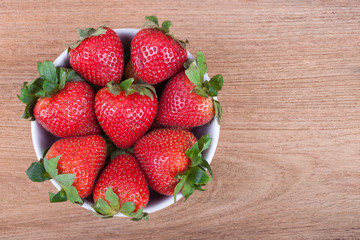 Fresh strawberries on wooden
