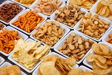 Foto op Plexiglas Many types of savoury snack in white dishes © Moving Moment