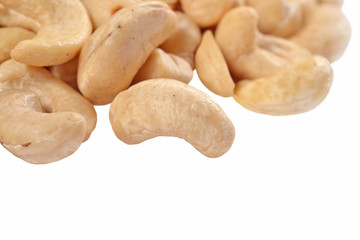 Heap of cashews on a white