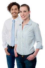 Two young business executives posing
