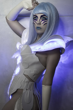tech woman robot with led light dress, white and blue hair