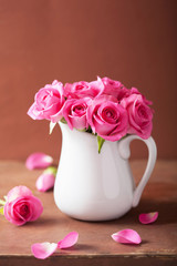 beautiful pink roses bouquet in vase © Olga Miltsova