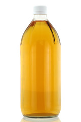 A bottle of filtered Apple Cider Vinegar isolated on white