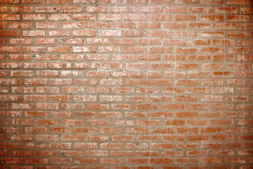 Weathered stained old brick wall background