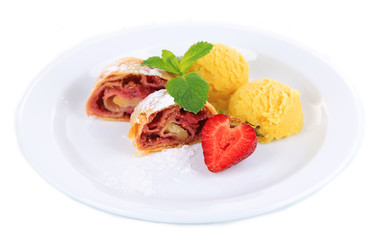 Tasty homemade strudel with ice-cream, fresh strawberry and