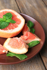 Ripe chopped grapefruit with mint leaves