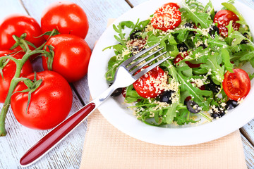 Fresh salad with arugula, close up