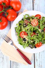 Fresh salad with arugula, close up