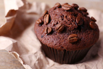 Chocolate muffin and coffee grains