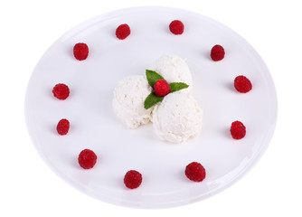 Creamy ice cream with raspberries on plate, isolated on white