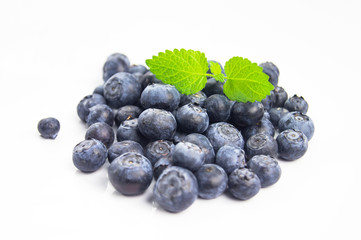 Blueberries with green leaf on white background, isolate