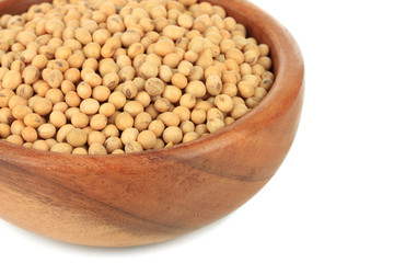 Soy beans in bowl isolated on white