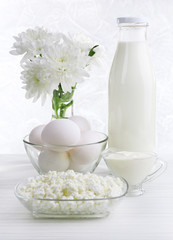 Tasty dairy products on wooden table