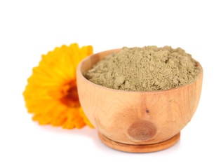 Dry henna powder in bowl, isolated on white