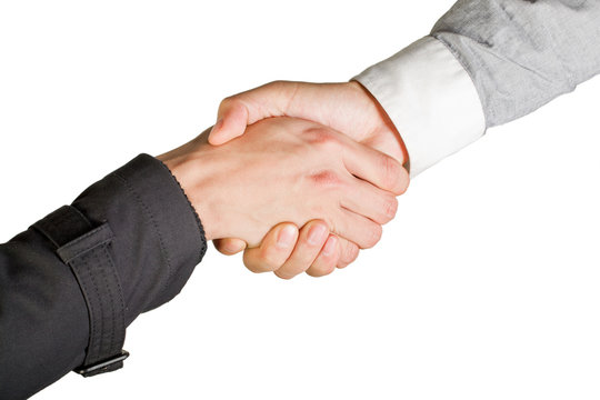 Hand shake between two businessmen isolated on white