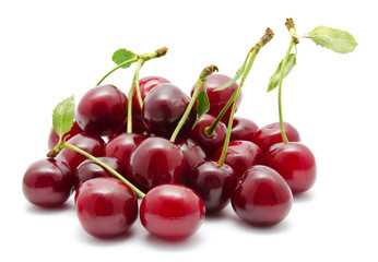 Juicy cherry with leaf isolated