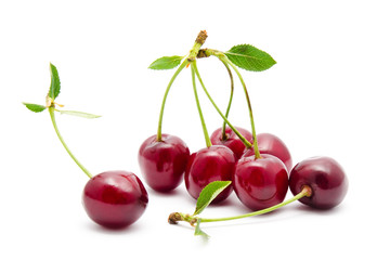 Juicy cherry with leaf isolated