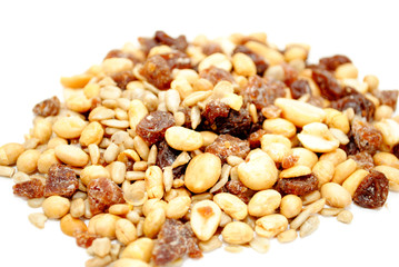 Piled Raisin and Nut Trail Mix Over White