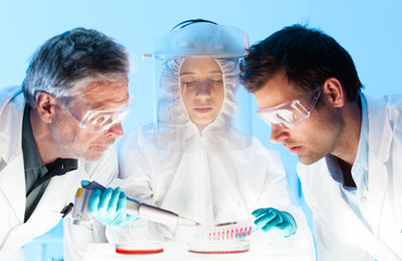 Life scientist pipetting.