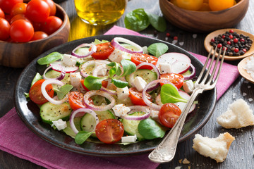 vegetable salad with feta cheese on a plate