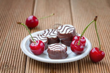 Swiss cookies with ripe cherries