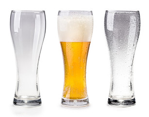 An empty cup, a cup of beer, an empty glass cup on white