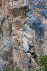 Female climber on a cliff