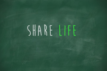 Share life handwritten on blackboard