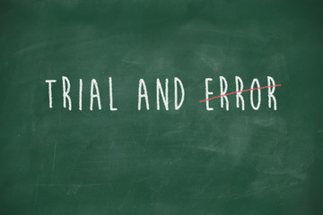 Trial and error handwritten on blackboard