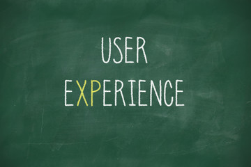 User experience handwritten on blackboard